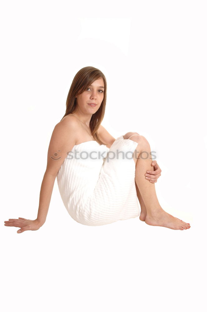 Similar – Young tall athletic woman with long bare legs sits barefoot on a light couch