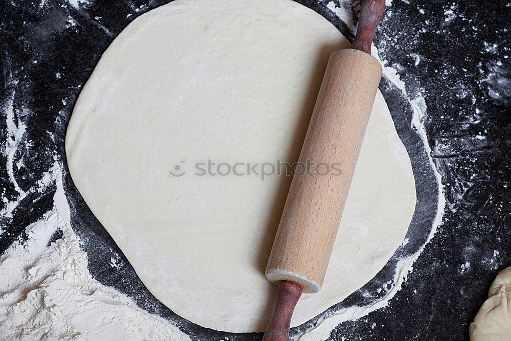 Similar – Image, Stock Photo Making homemade taglatelle with a pasta rolling cutter