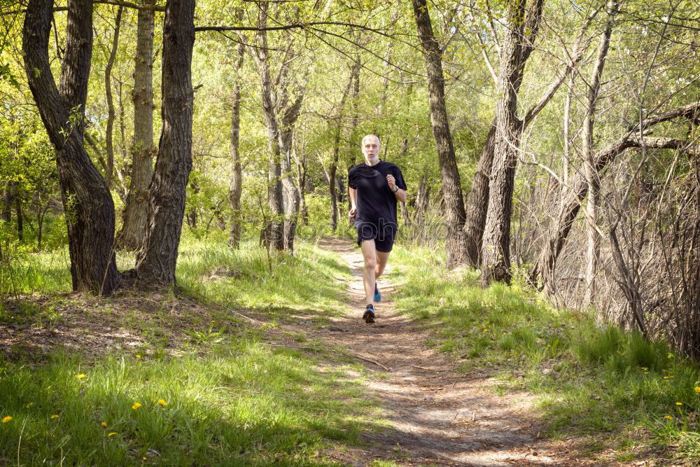 Similar – Senior Man Running in the Forest