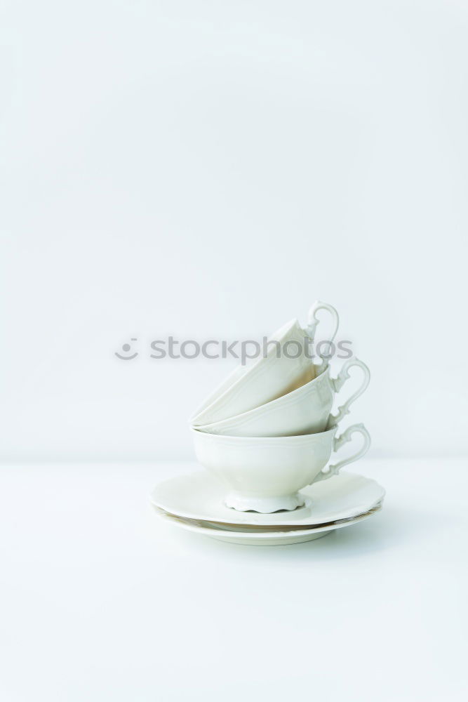 Similar – Crockery arrangement with flower