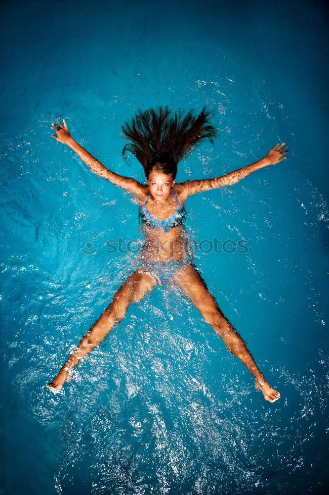 Similar – Image, Stock Photo Young mixed woman with afro hair jumping outdoors.