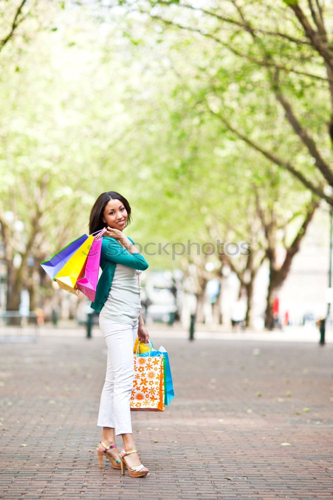 Similar – Image, Stock Photo Content female in trendy wear doing shopping at city street