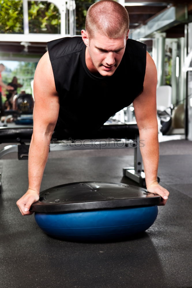 Similar – Image, Stock Photo Fit, muscular young man doing plank at the gym