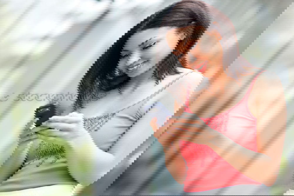 Similar – Image, Stock Photo Young beautiful woman in yellow dress using mobile phone