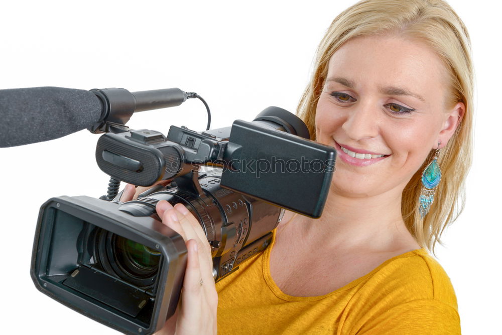 Similar – Young woman taking pictures with an instant camera