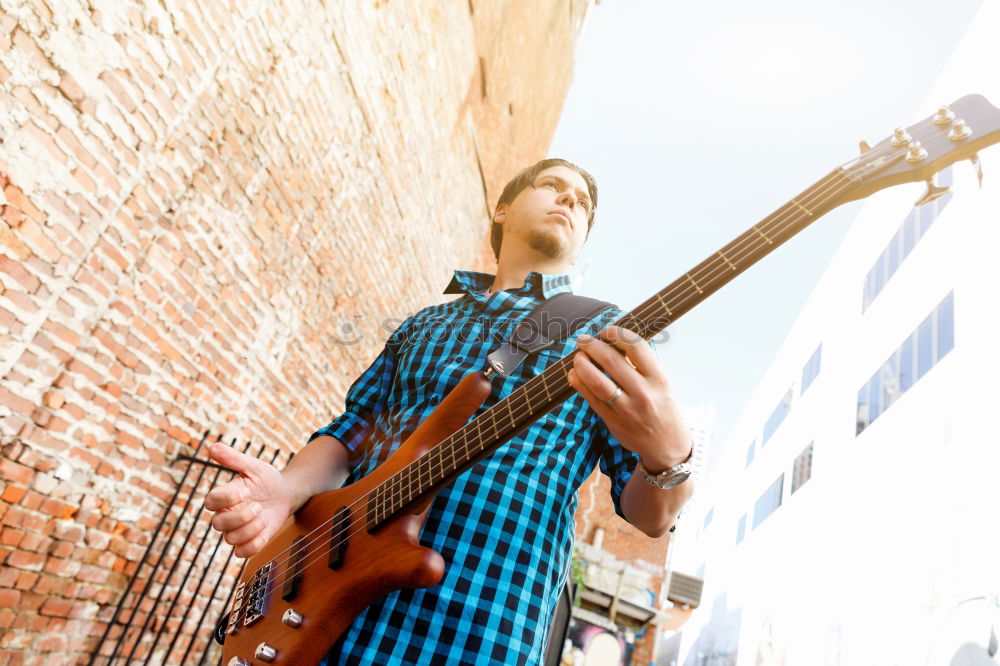 Similar – Image, Stock Photo outdoor photo session with a bass player and his instruments