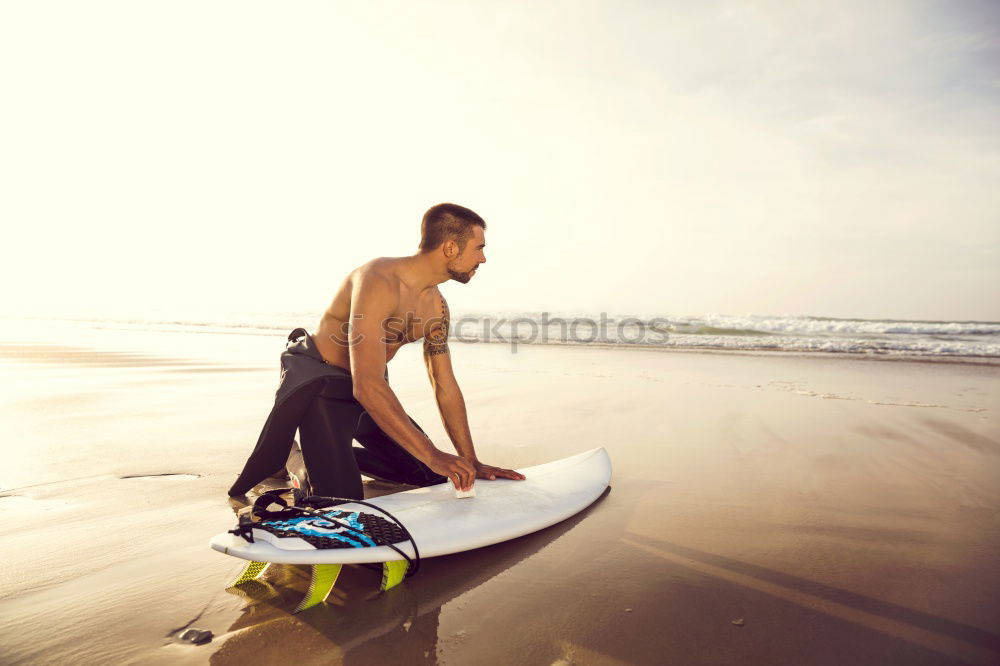 Similar – Tattooed man holding skateboard