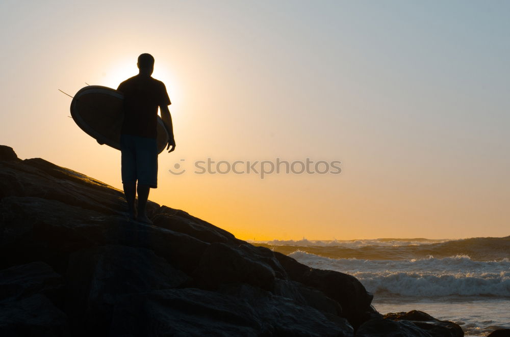 Similar – Image, Stock Photo Young man reflected on the beach in the waves