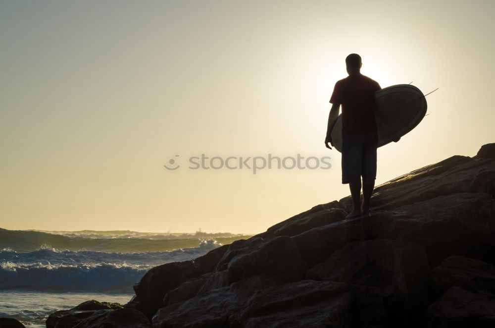 Similar – Image, Stock Photo Young man reflected on the beach in the waves