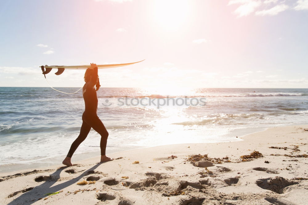 Similar – Man with skateboard looking at sea