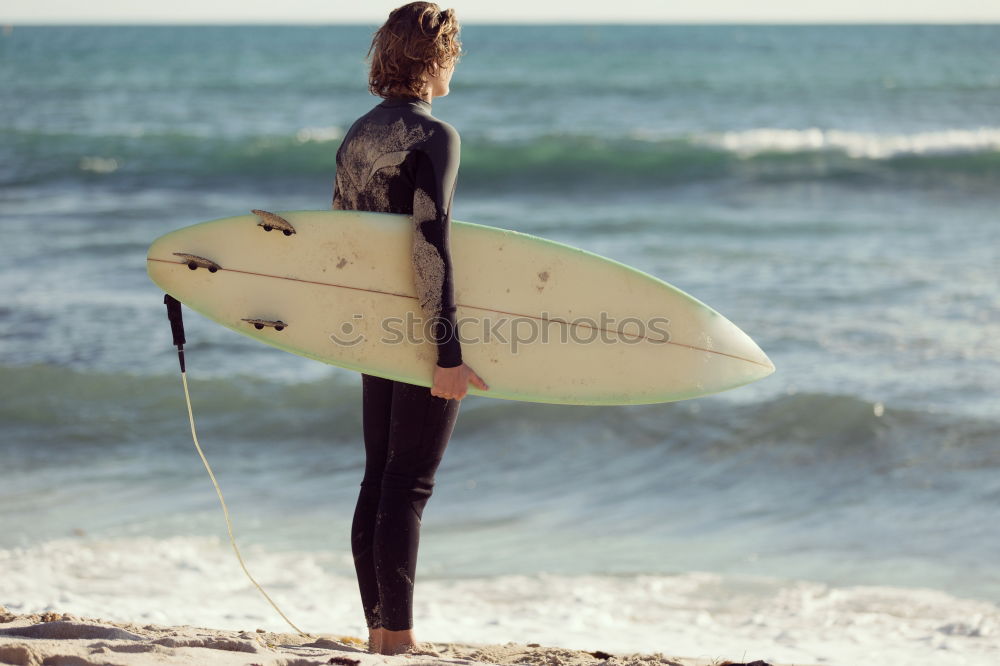 Similar – Tattooed man holding skateboard