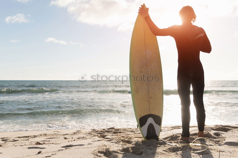 Similar – Man with skateboard looking at sea