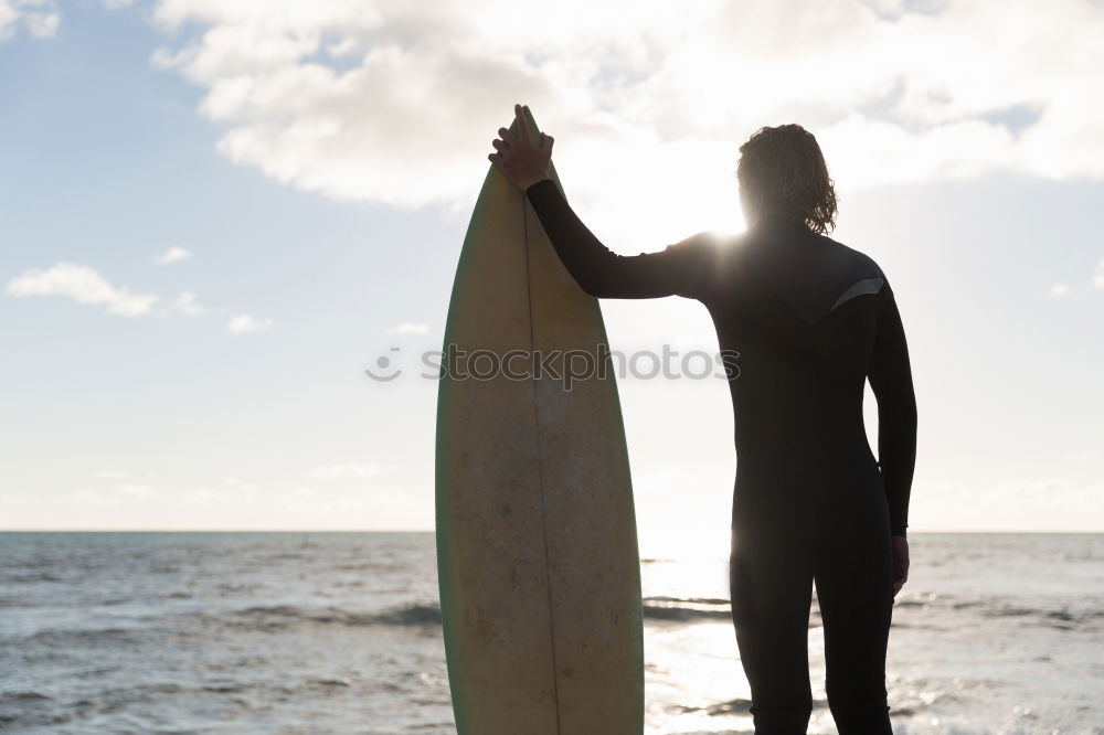 Similar – Image, Stock Photo Man in wetsuit swimming in ocean