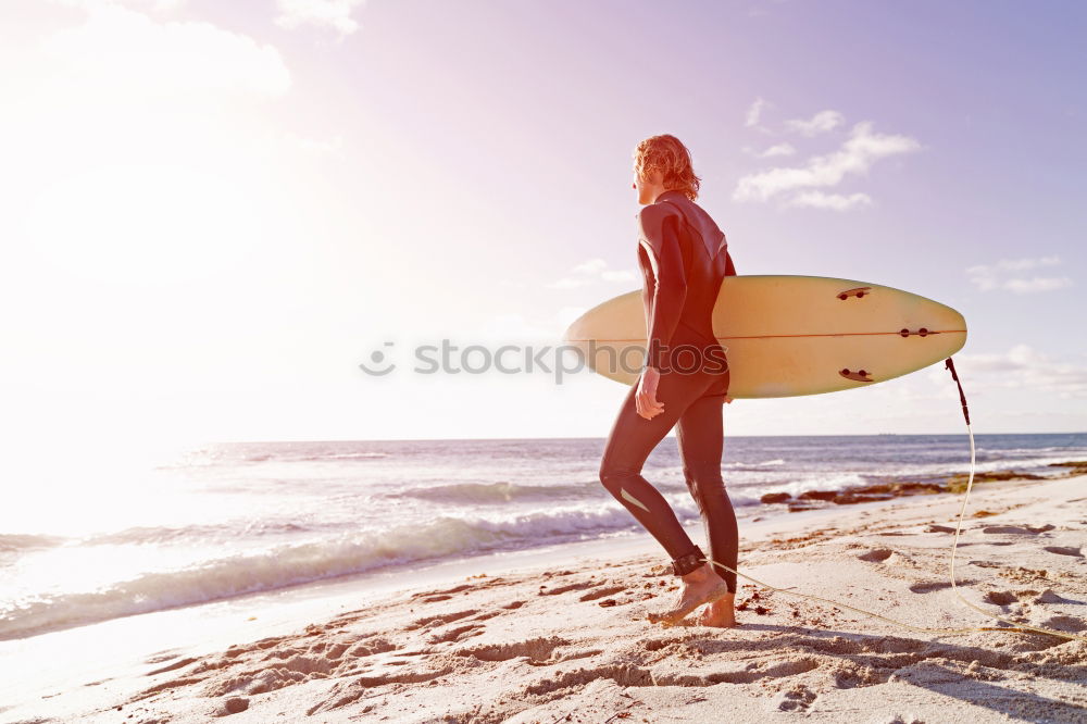 Similar – Surfer girl on the white sand beach