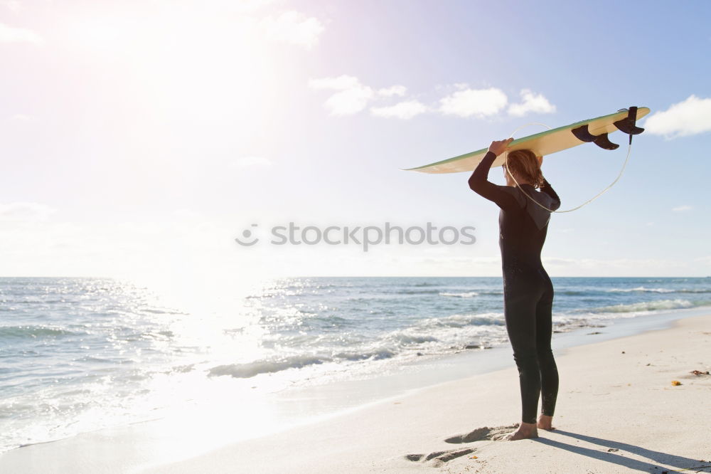 Similar – Man with skateboard looking at sea