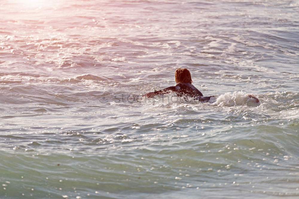 Similar – Woman goes in the water