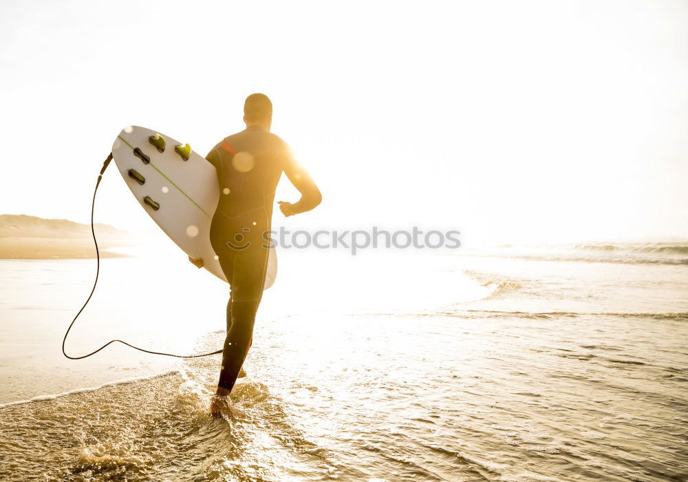 Similar – Image, Stock Photo Man in wetsuit swimming in ocean