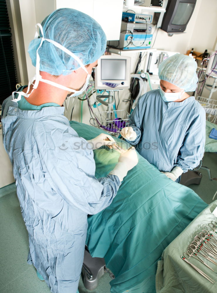 Similar – Team of Surgeons Operating.