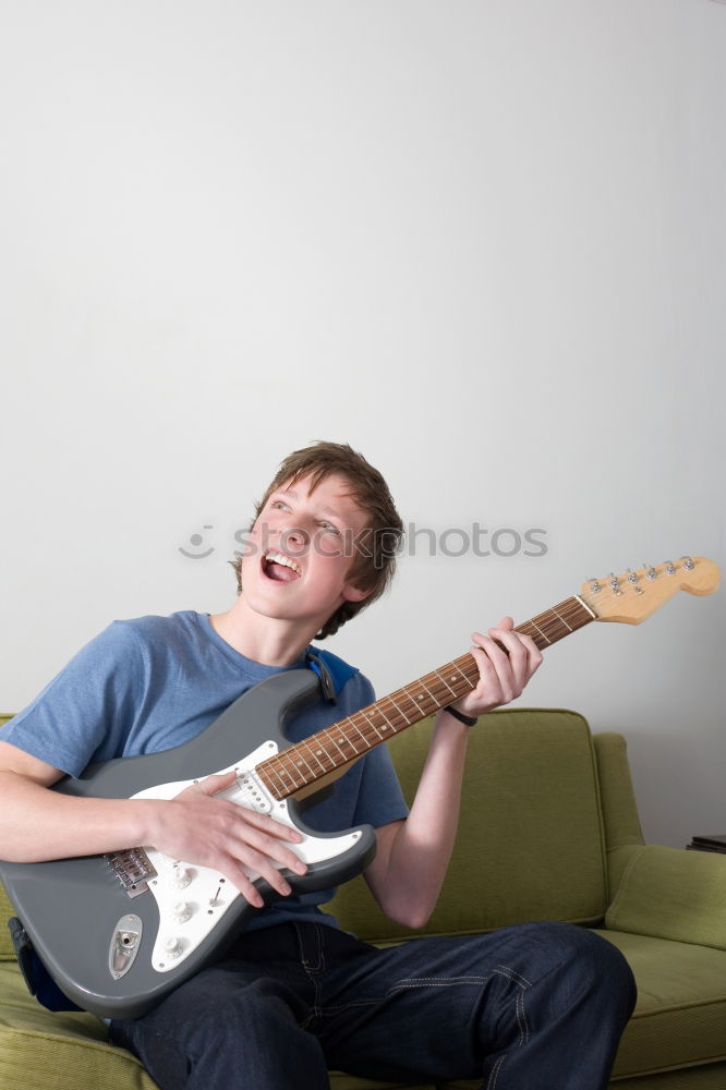 Similar – Image, Stock Photo Vibration | guitar pages. Young woman holding guitar