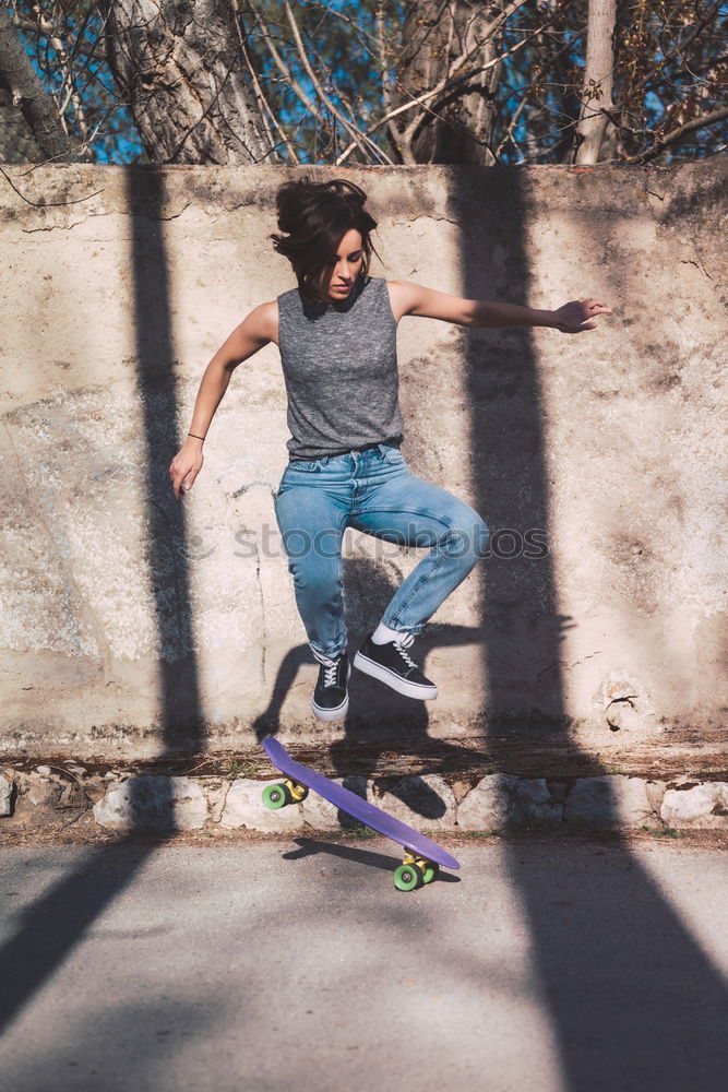 Similar – Image, Stock Photo Skateboarding woman practicing at skatepark