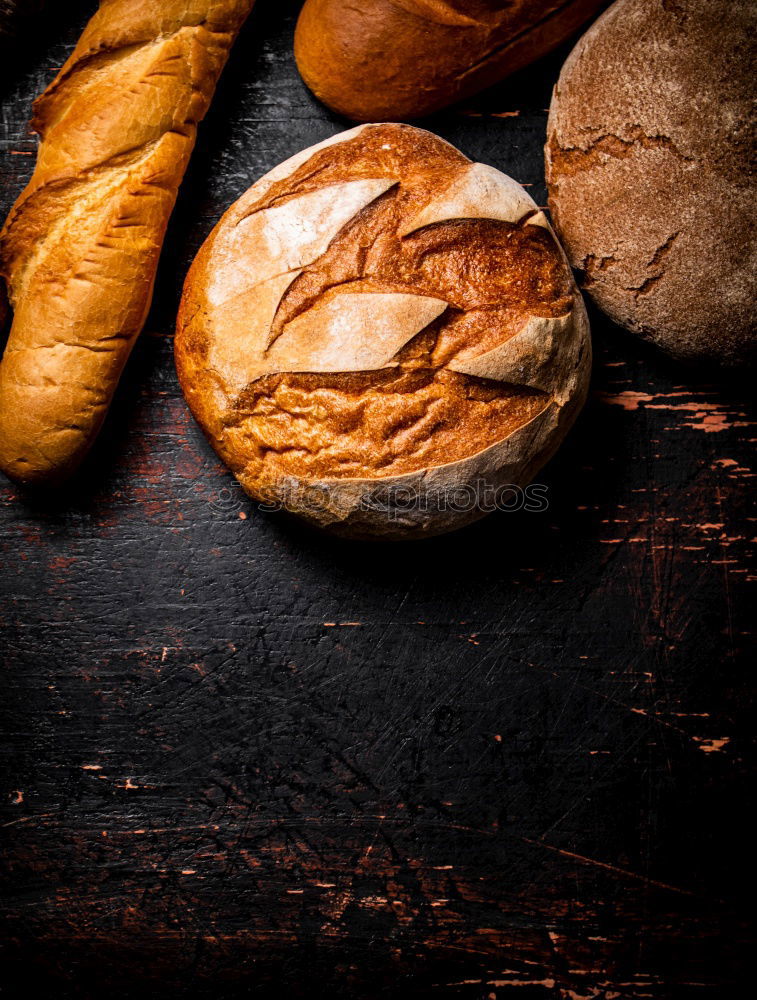 Similar – fresh bread and baked goods on wooden