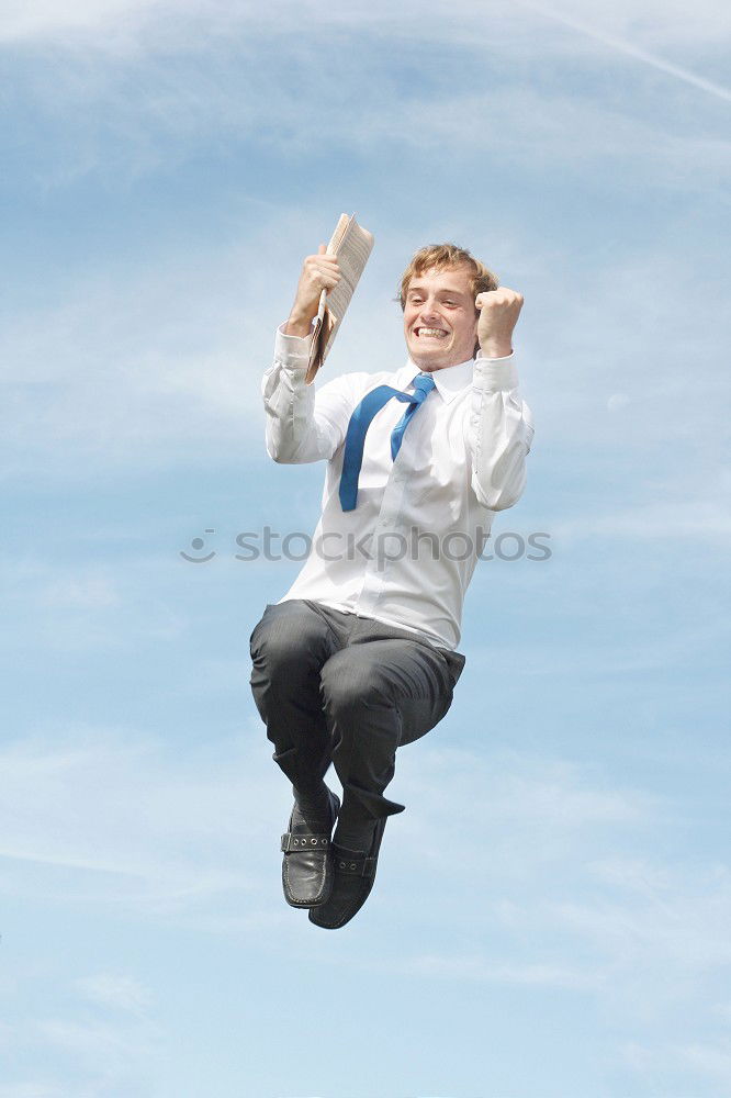 Similar – Two businessmen shaking hands in the air