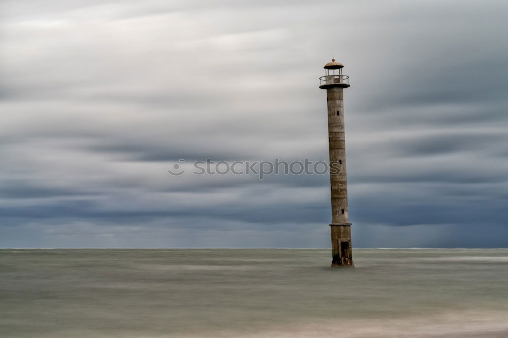 Similar – Foto Bild Leuchtturm vor Meer bei bewölktem himmel.