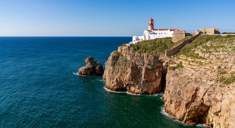 Similar – Wunderschöner Leuchtturm auf den hohen Klippen des Saint Vincent Kaps in der Algarve, Portugal