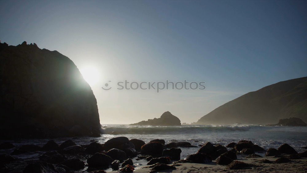 Similar – Image, Stock Photo Big chunk. Huge rock lies in the Pacific surf. Queensland. Australia. In the background very small : skyscrapers.