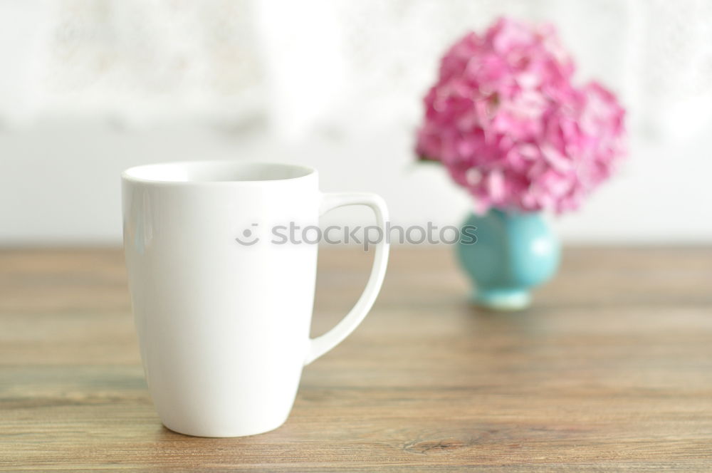 Similar – Crockery arrangement with flower