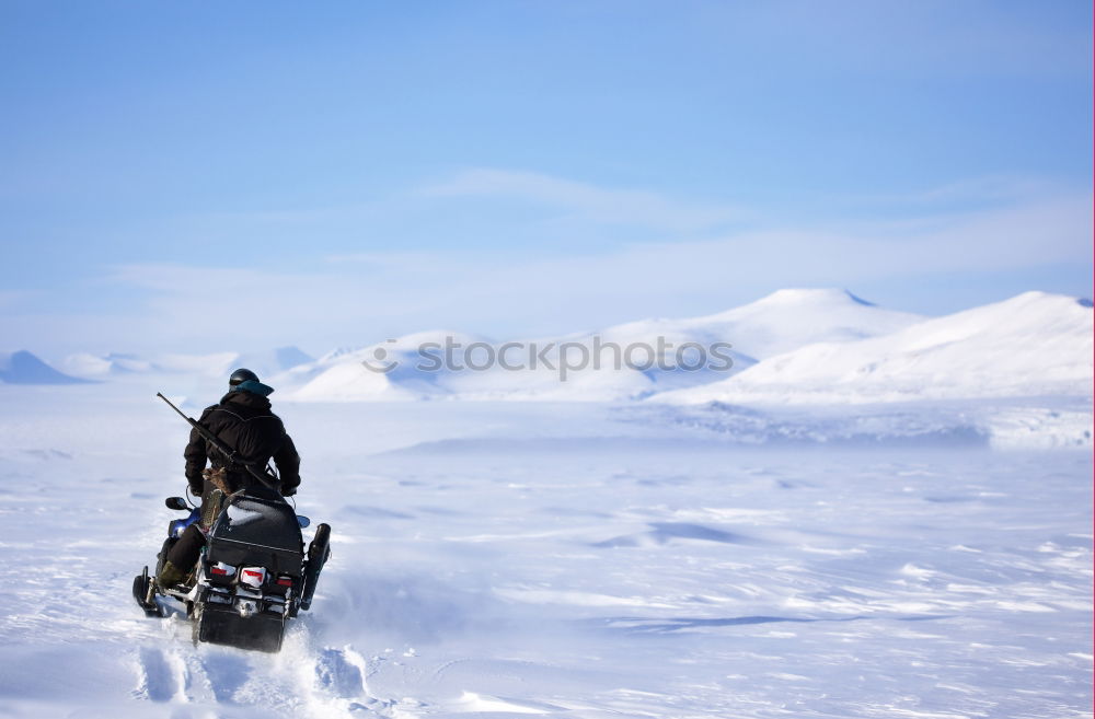 Similar – Image, Stock Photo Man with motorcycle in snowy highlands