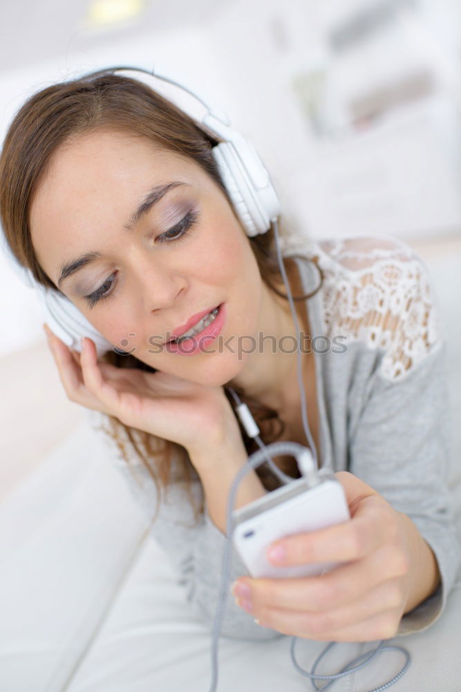 Similar – Image, Stock Photo Young blonde girl using a smartphone while sitting