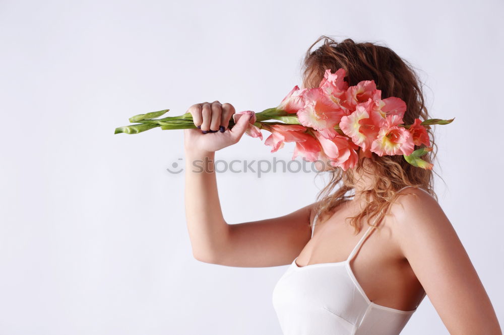 Similar – Sensual woman with roses lying on bed