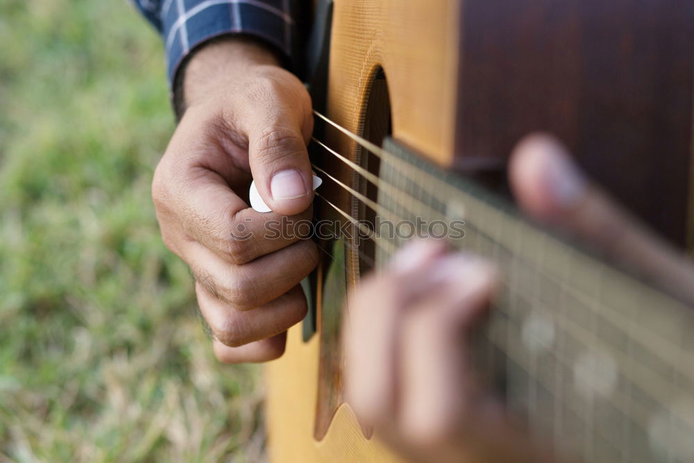 Similar – Hand mit Ukulele im Wald