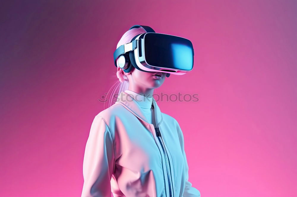 Similar – Image, Stock Photo Boy with virtual reality glasses on colorful background. Future technology, VR concept