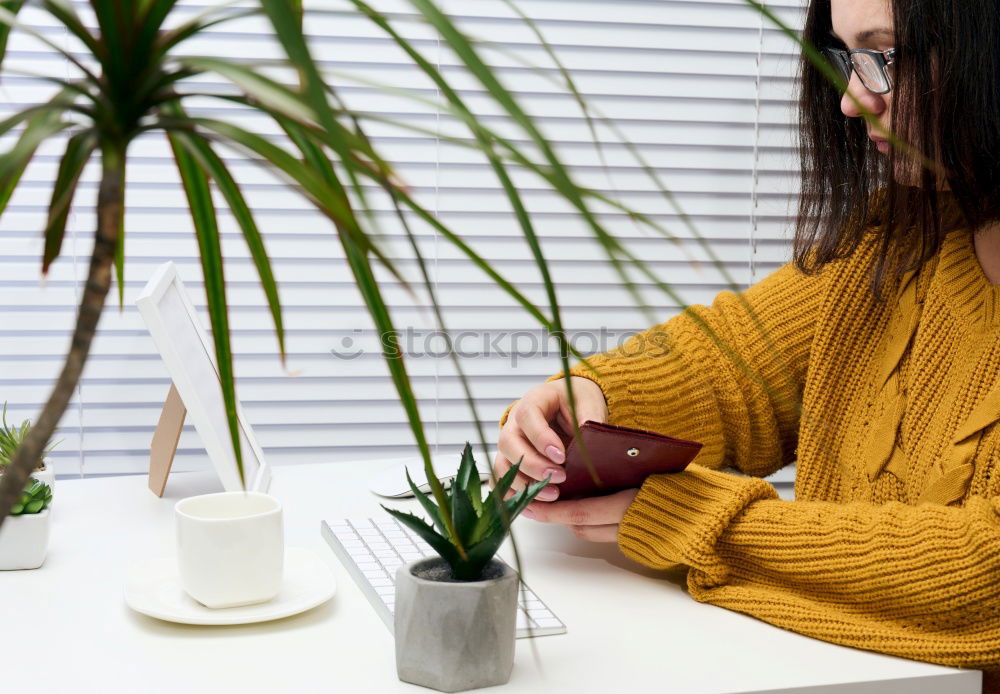 Similar – Happy young woman holding a cup of tea or coffee