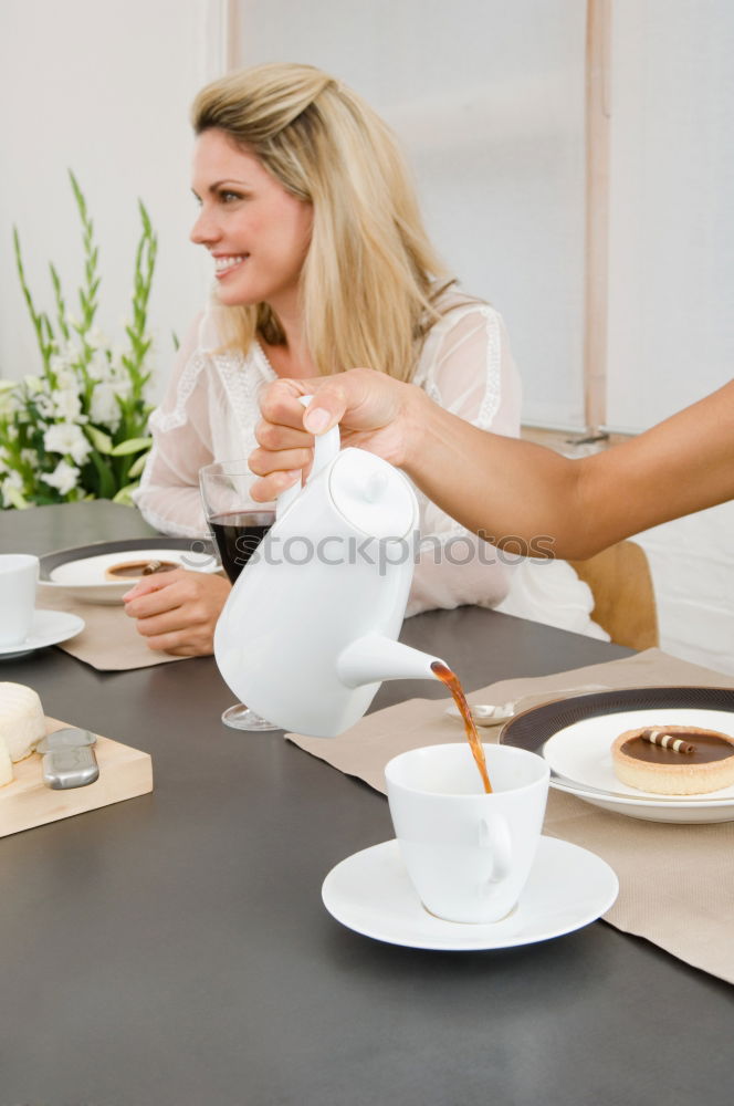 Similar – Hands with coffee cups on table in a urban cafe.