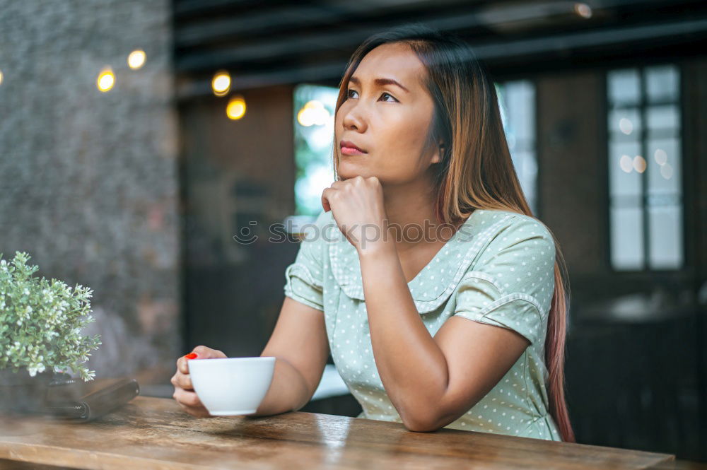 Similar – Ethnic woman stirring cup of coffee