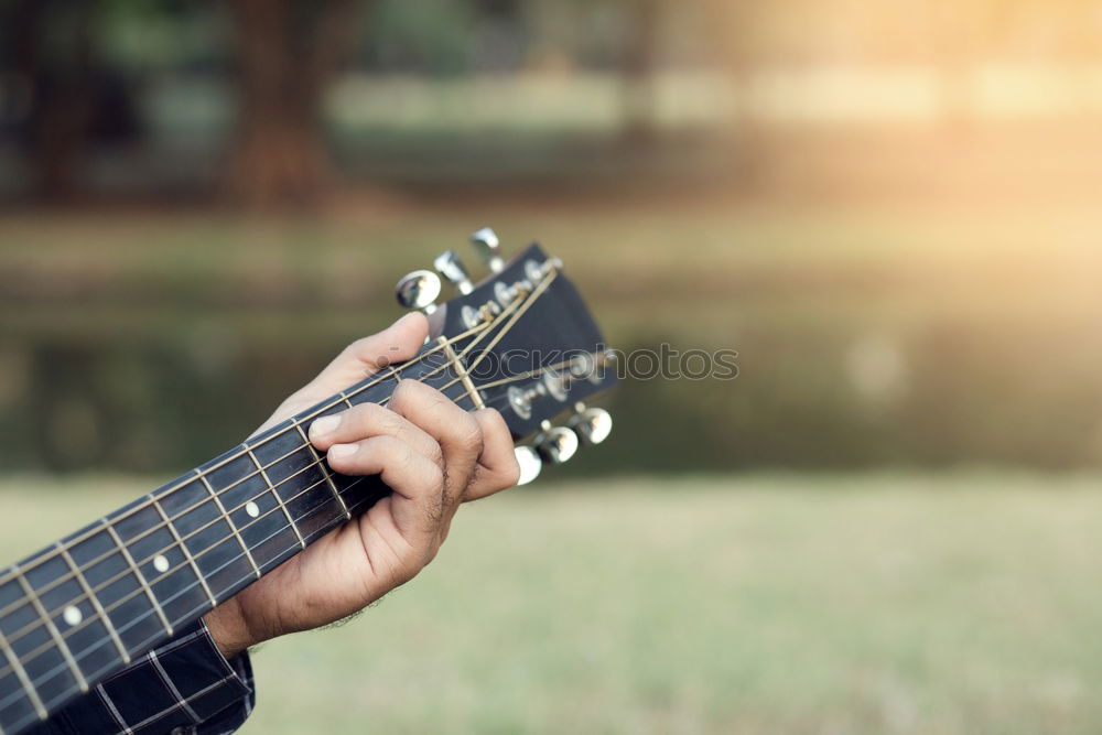 Similar – Image, Stock Photo Man with guitar on field