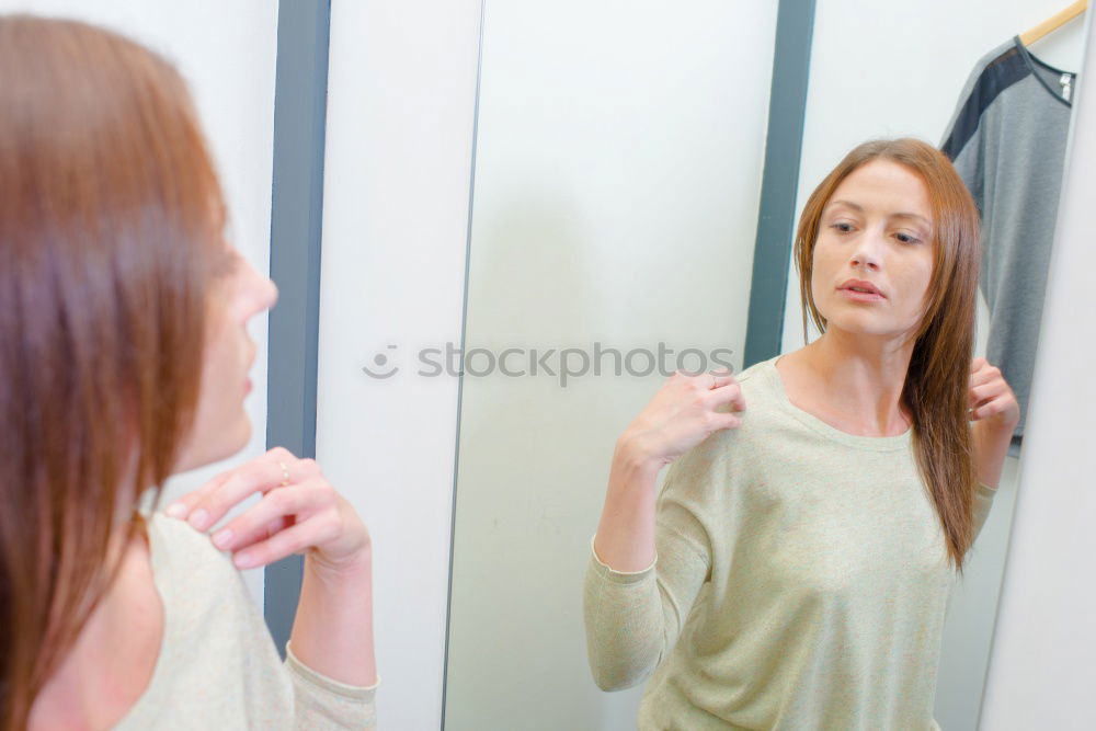 Similar – Young female adult brushing teeth in the morning