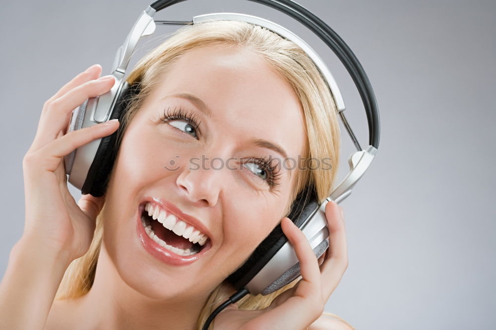 Similar – Image, Stock Photo Pretty blonde woman listening to music on couch at home