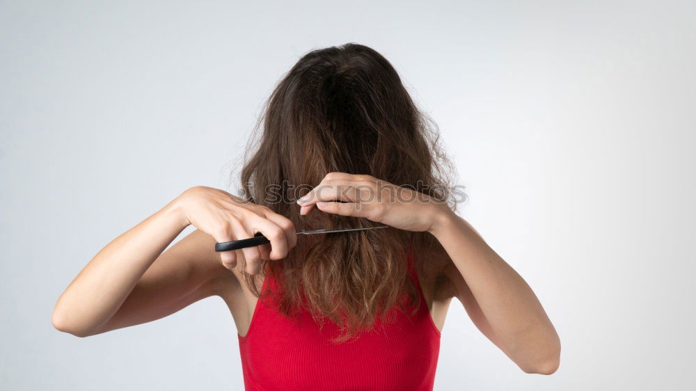 Similar – Analogue (6×6) back portrait of young woman with long brunette hair tied into a braid