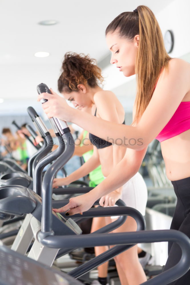 Concentrated woman in hard bike training session