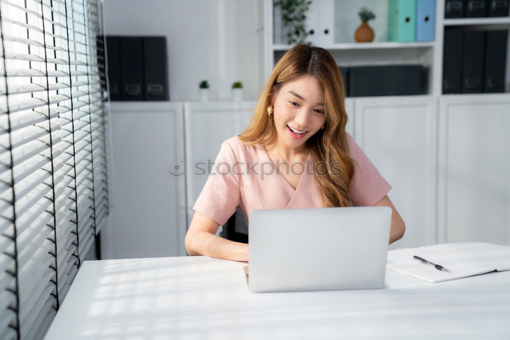 Similar – Young beautiful blonde woman on the computer working