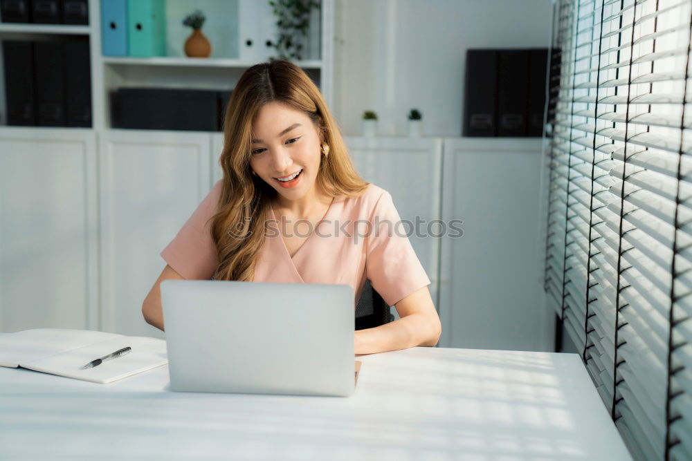 Similar – Young beautiful blonde woman on the computer working