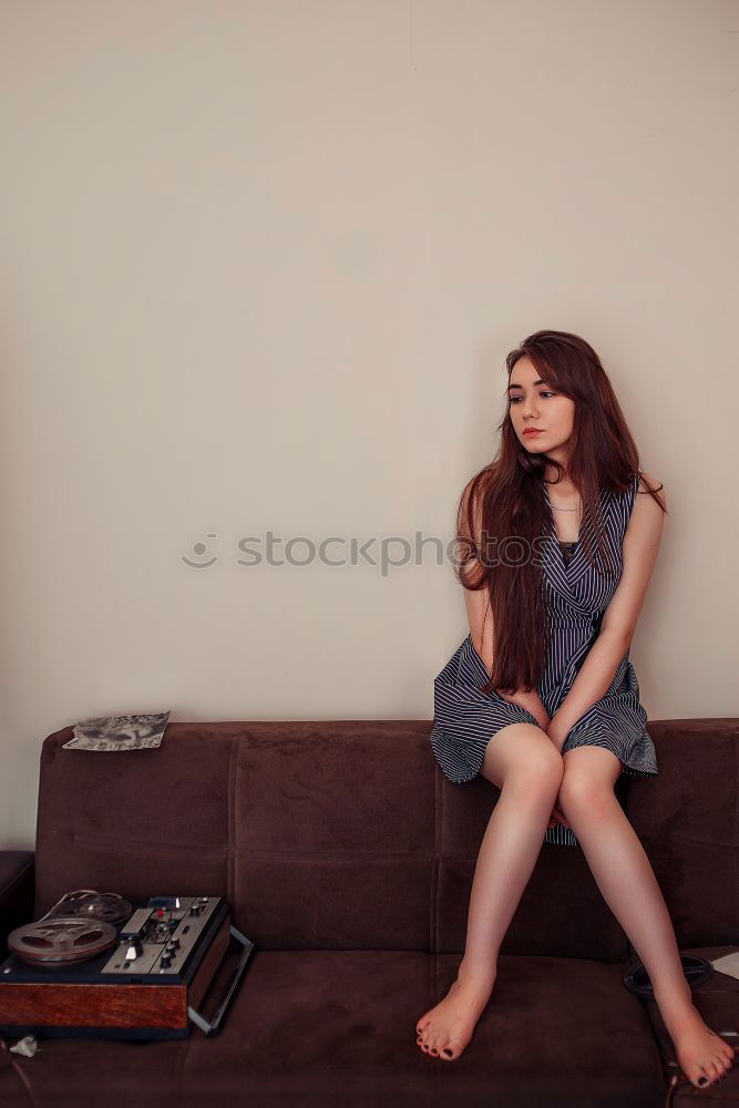 Similar – Image, Stock Photo Pretty woman sitting on couch