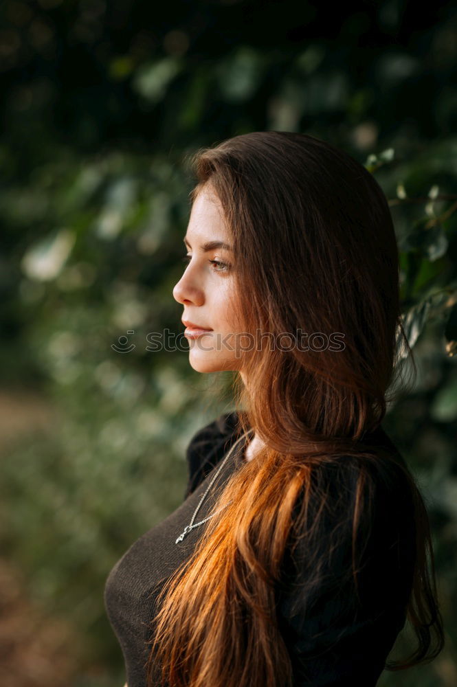 Similar – Young natural woman with freckles and wild curly hair looking at the camera