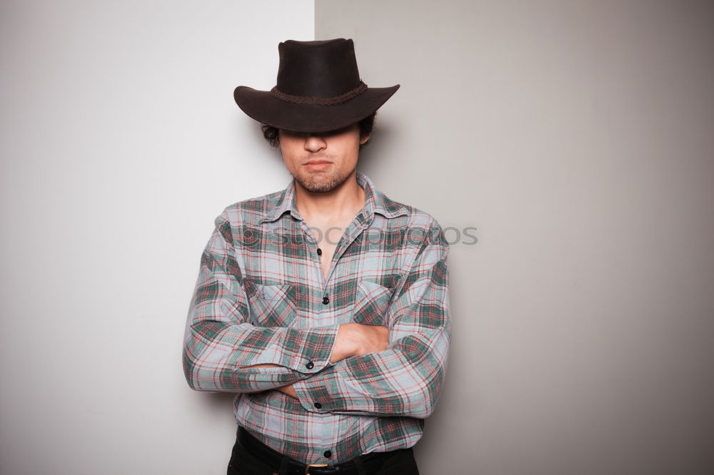 Similar – Image, Stock Photo Bearded man in hat against sunlight