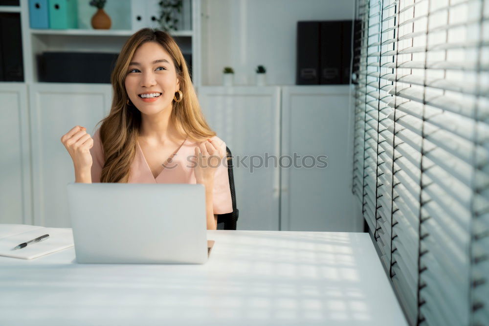 Similar – Young beautiful blonde woman on the computer working