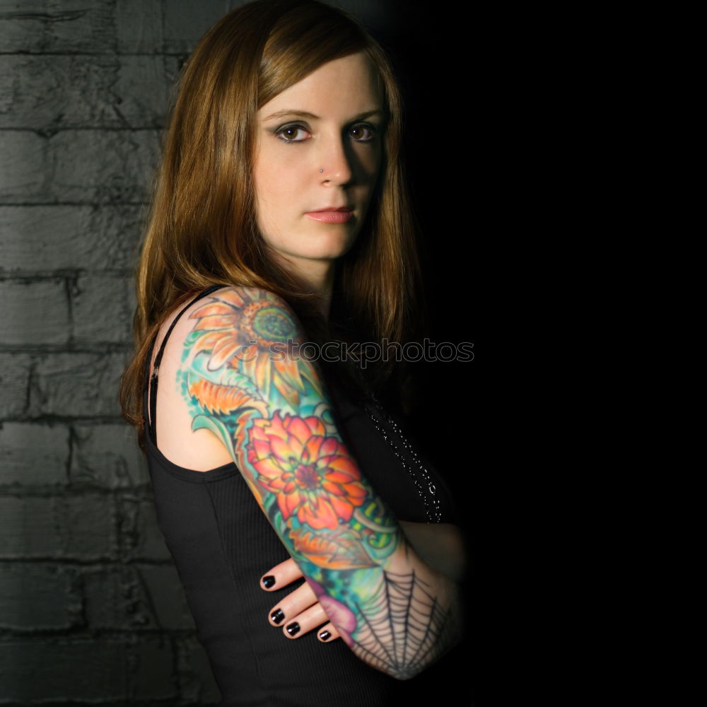 Similar – Beautiful and tattooed young woman